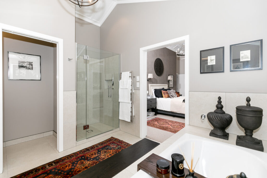 Luxury ensuite with walk-in shower and bath