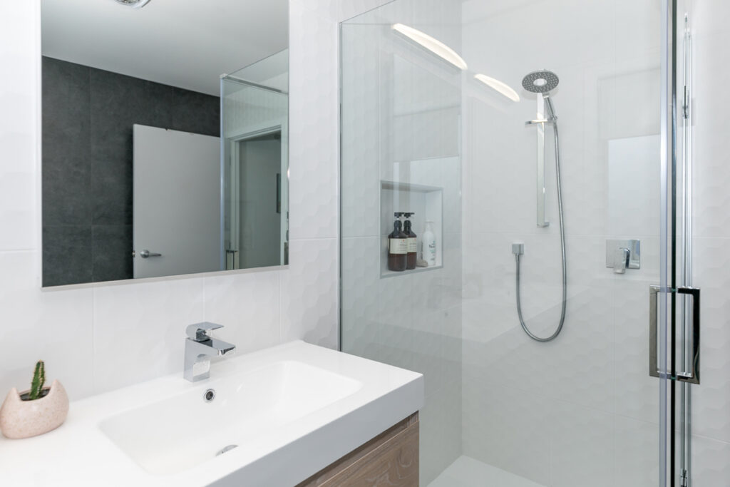 Modern bathroom vanity and glass shower